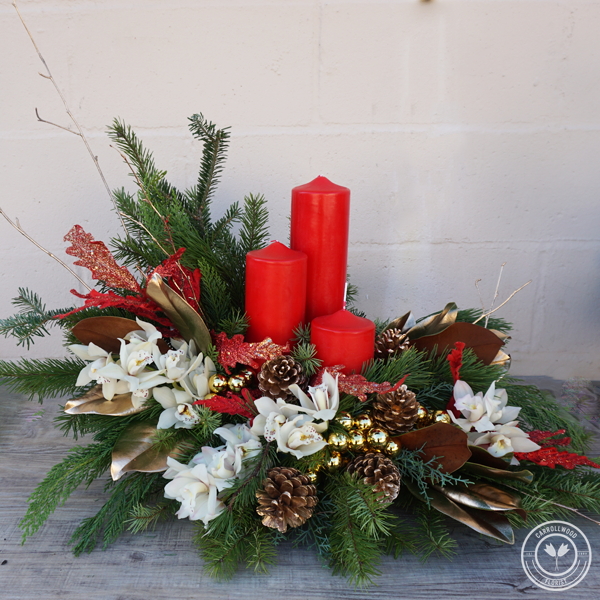 A few of our favorite... Christmas Centerpieces! • Carrollwood Florist Blog